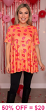 Orange baby doll top with kisses