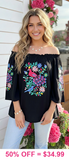 Black blouse with floral peacock embroidery