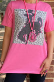 Pink top with bronc rider graphic