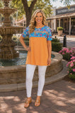 Orange top with blue floral and sequin stripe