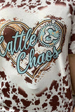 Cattle & Chaos" cow print top
