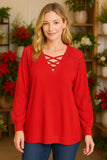 Red waffle knit with lace insets and criss cross neck