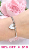Silver bracelet with white heart