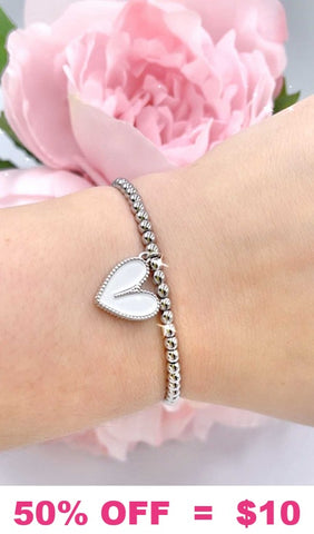 Silver bracelet with white heart