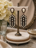 Oval Cream Stone Concho Earrings in Copper tone.