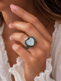 Bling Heart White Iridescent stone ring with turquoise and silver setting