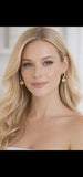 Gold Huggie earrings with heart charm