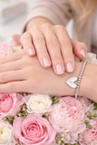 Silver bracelet with white heart