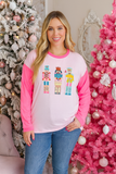 Nutcracker patches neon pink long sleeve top