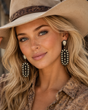 Oval Cream Stone Concho Earrings in Copper tone.
