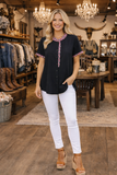 Large: Black top with pink leopard ruffle trim
